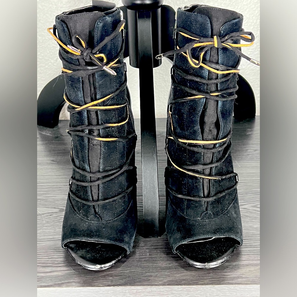 Lace-up, side zippered, 4 1/2” heeled, mid-calf boots